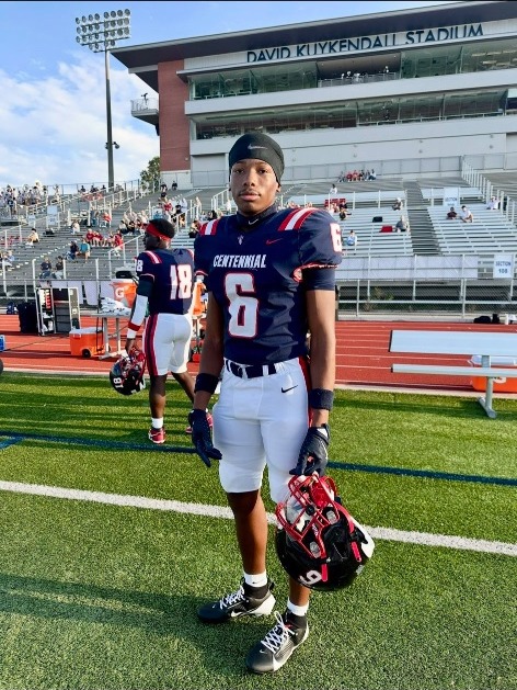 Karmelo Anthony in Centennial High School football uniform, #6