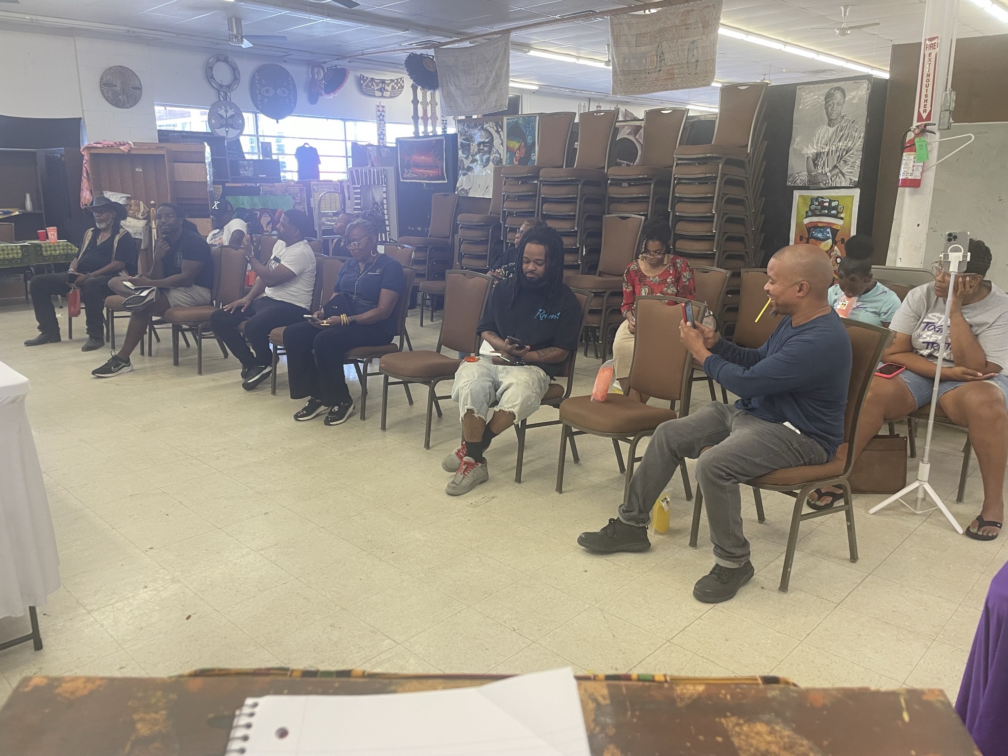 Attendees in discussion at Teach-In No. 001